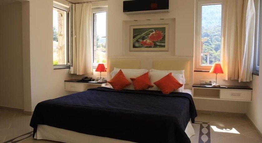 Imagen de la habitación del Golden Life Heights Deluxe Suite Hotel - Adults Only. Foto 10
