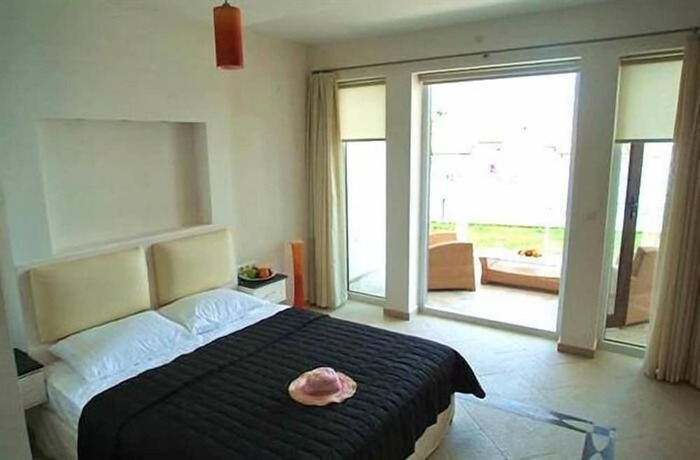 Imagen de la habitación del Golden Life Heights Deluxe Suite Hotel - Adults Only. Foto 11
