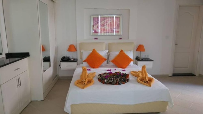Imagen de la habitación del Golden Life Heights Deluxe Suite Hotel - Adults Only. Foto 12