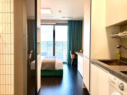 Imagen de la habitación del Golden Planet Hotel-Pyeongtaek Godeck. Foto 18