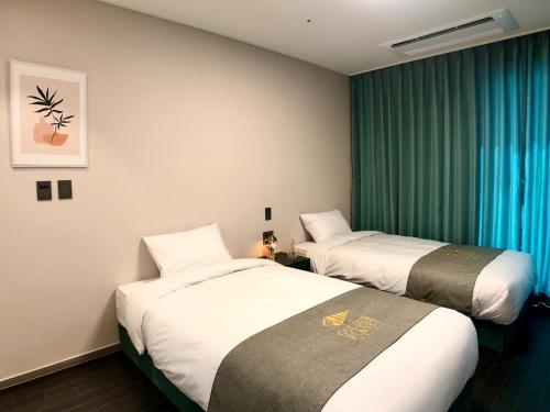 Imagen de la habitación del Golden Planet Hotel-Pyeongtaek Godeck. Foto 19