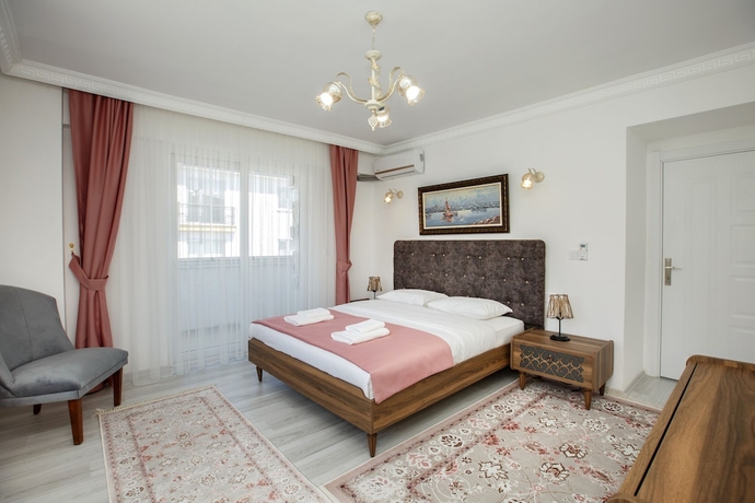 Imagen de la habitación del Golden Star Suites. Foto 2