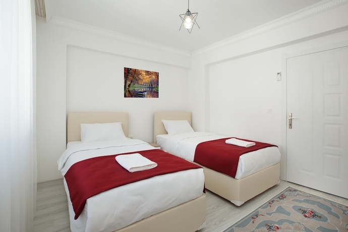 Imagen de la habitación del Golden Star Suites. Foto 5