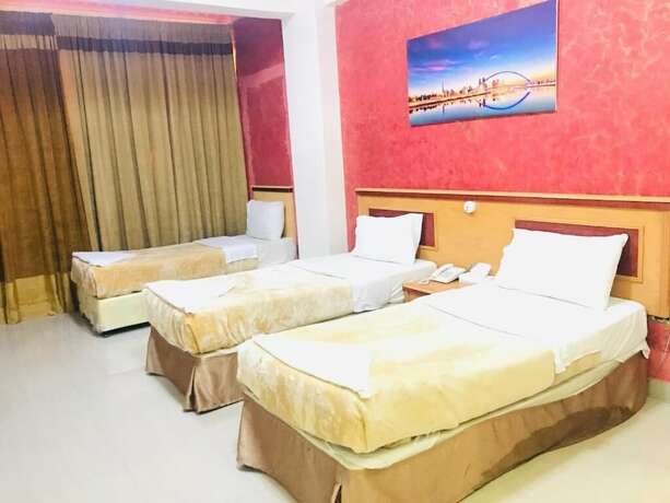 Imagen de la habitación del Golden Touch Hotel. Foto 16