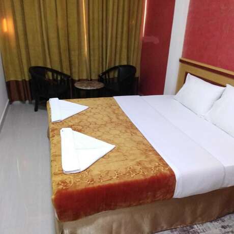 Imagen de la habitación del Golden Touch Hotel. Foto 17