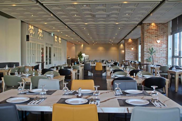 Imagen del bar/restaurante del Golden Tulip Ever Yongin Hotel. Foto 3