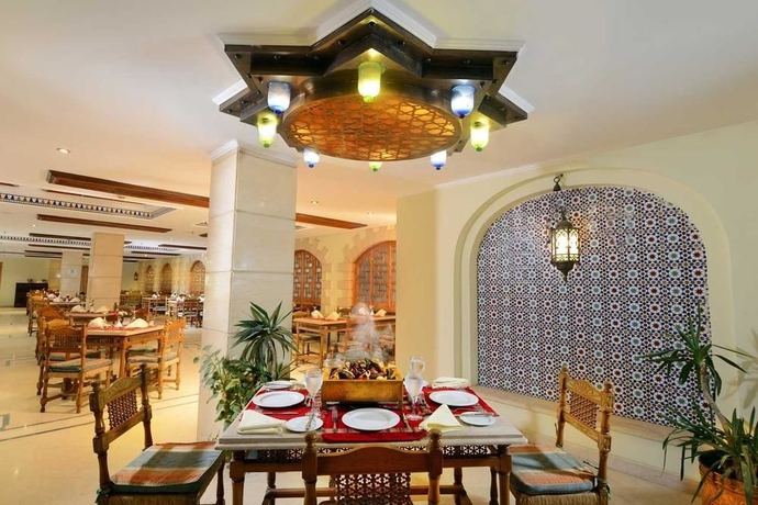 Imagen del bar/restaurante del Golden Tulip Narmer Pyramids. Foto 6