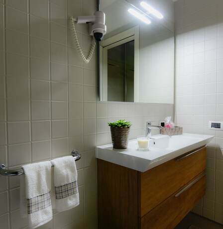 Imagen de la habitación del Golf Hotel Castelconturbia. Foto 13