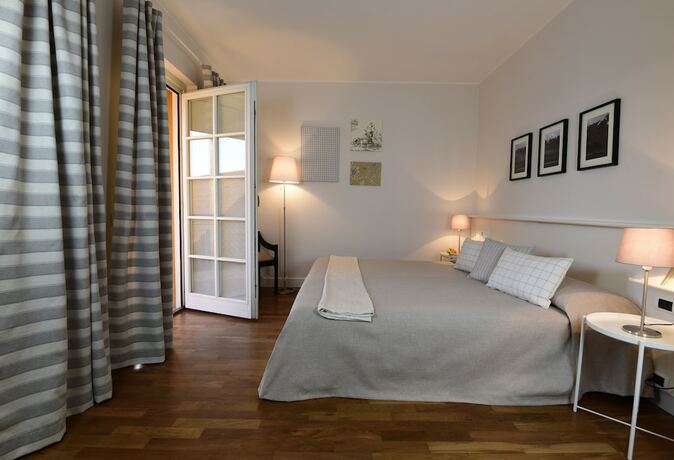 Imagen de la habitación del Golf Hotel Castelconturbia. Foto 15