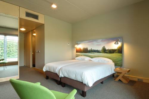 Imagen de la habitación del Golf Lodge. Foto 3