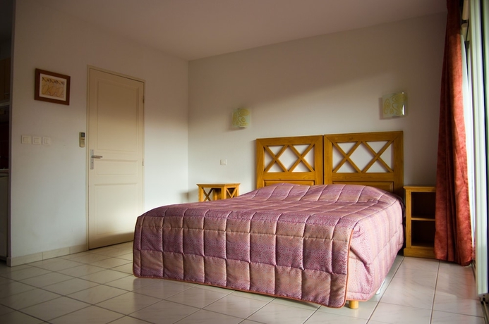 Imagen de la habitación del Golf and R&eacute;sidence de N&icirc;mes Vacquerolles. Foto 11