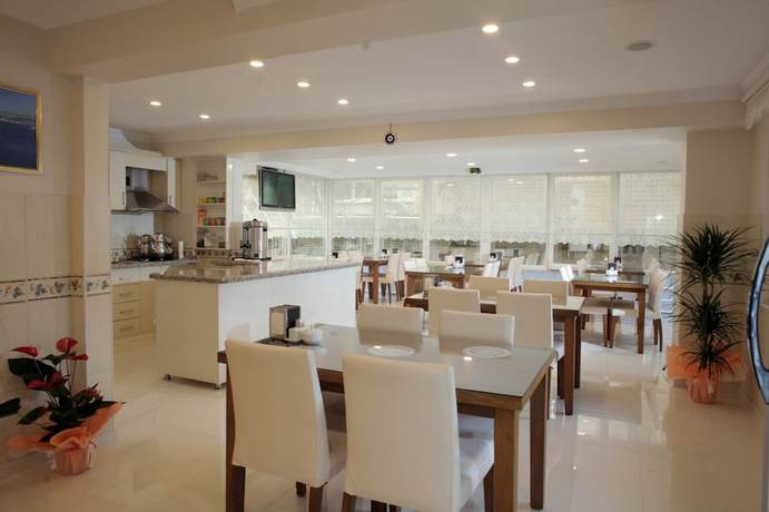 Imagen del bar/restaurante del G&ouml;nen Palmiye Butik Pansiyon. Foto 3