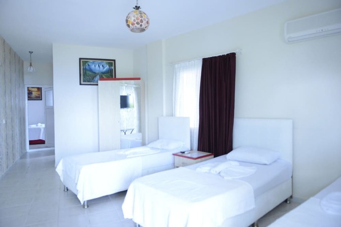 Imagen de la habitación del Grand Ada Family Hotel. Foto 2