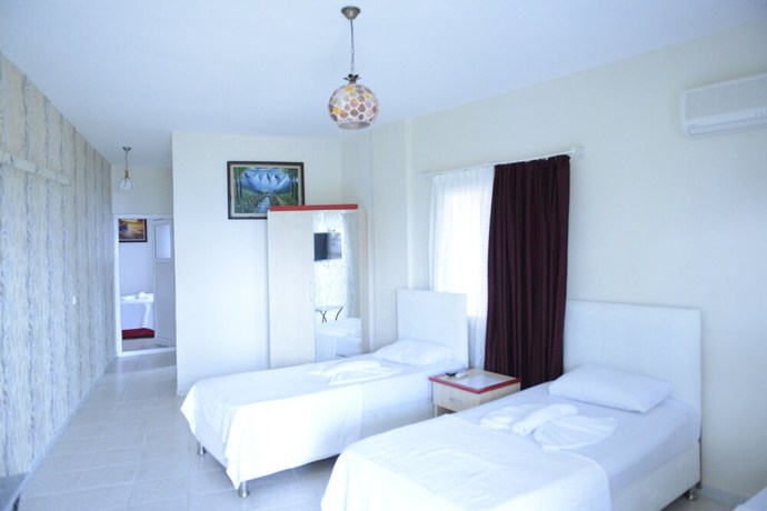 Imagen de la habitación del Grand Ada Family Hotel. Foto 16