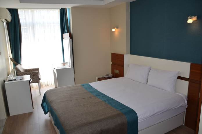 Imagen de la habitación del Grand Ahos Hotel and Spa. Foto 7