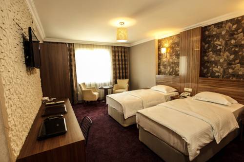 Imagen de la habitación del Grand Akcali Hotel. Foto 4