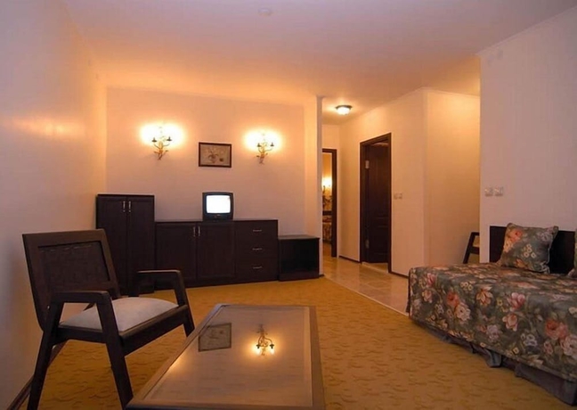 Imagen de la habitación del Grand Asa Family Suites. Foto 5