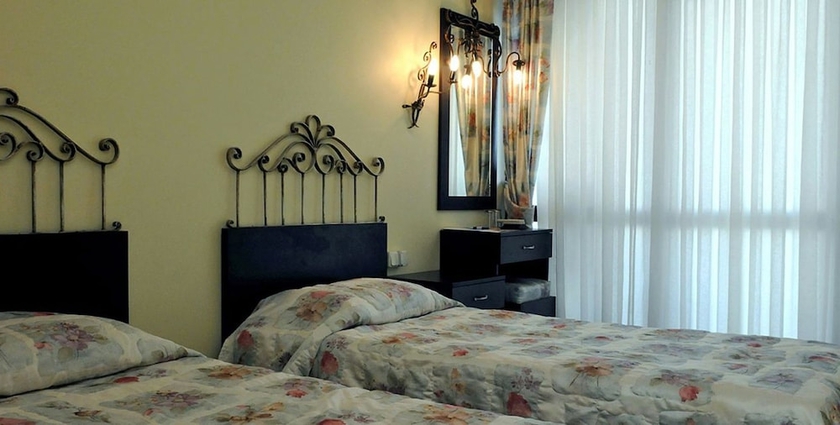 Imagen de la habitación del Grand Asa Family Suites. Foto 7