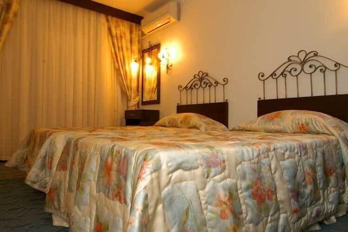 Imagen de la habitación del Grand Asa Family Suites. Foto 9