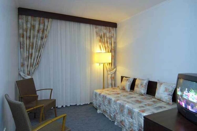 Imagen de la habitación del Grand Asa Family Suites. Foto 12