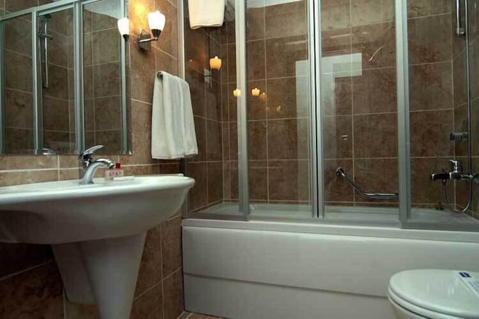 Imagen de la habitación del Grand Asa Family Suites. Foto 13