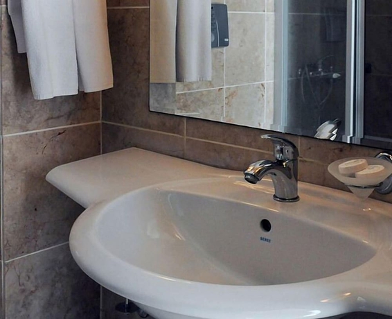 Imagen de la habitación del Grand Asa Family Suites. Foto 15