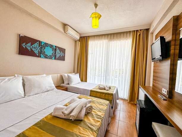 Imagen de la habitación del Grand Avşa Otel. Foto 11