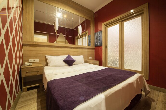 Imagen de la habitación del Grand Aydin Pera Hotel. Foto 16