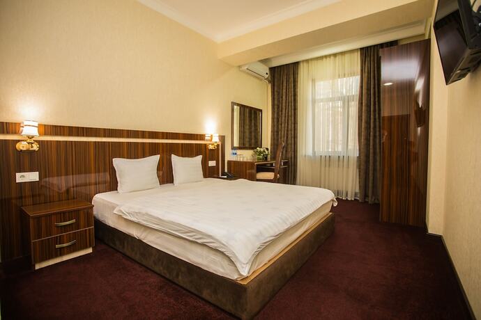 Imagen de la habitación del Grand Capital Hotel. Foto 15