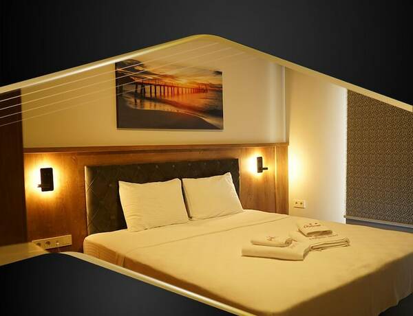Imagen de la habitación del Grand &Ccedil;aykaram Hotel. Foto 15
