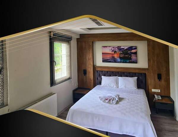 Imagen de la habitación del Grand &Ccedil;aykaram Hotel. Foto 18