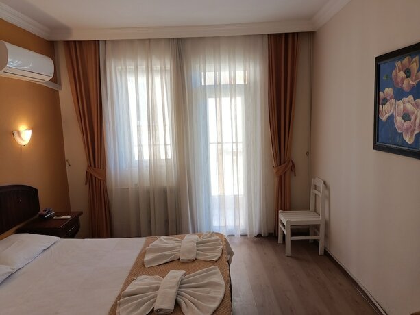Imagen de la habitación del Grand Cnr Hotels. Foto 19