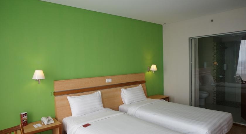 Imagen de la habitación del Grand Dafam Merapi Merbabu. Foto 1