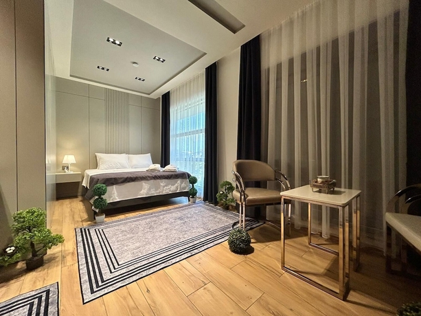 Imagen de la habitación del Grand Diker Port Residence. Foto 12