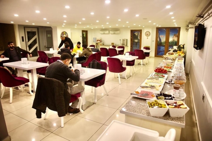 Imagen del bar/restaurante del Grand Dogan Otel. Foto 2