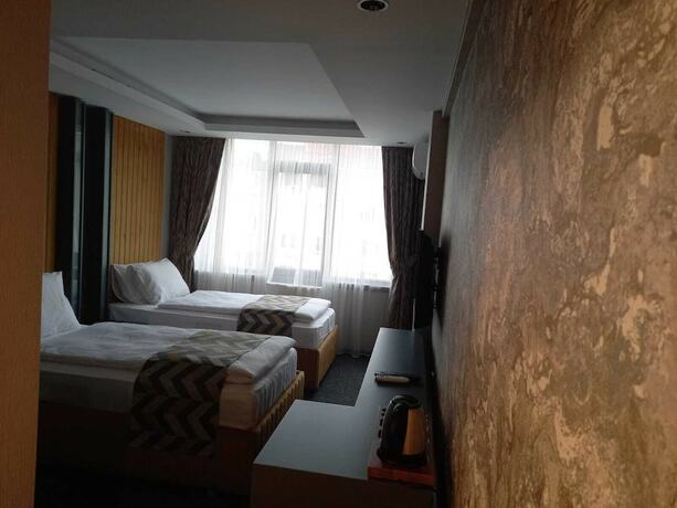 Imagen de la habitación del Grand Dora Hotel. Foto 15