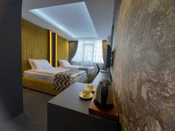 Imagen de la habitación del Grand Dora Hotel. Foto 17