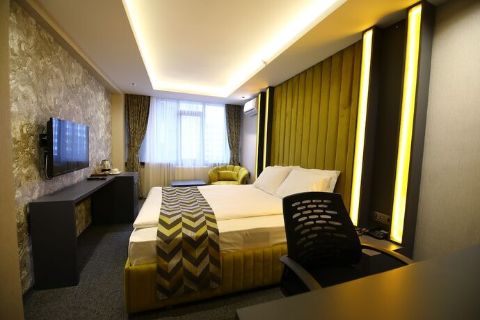 Imagen de la habitación del Grand Dora Hotel. Foto 18