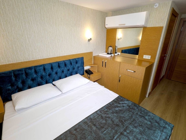 Imagen de la habitación del Grand Elmira Suites. Foto 4