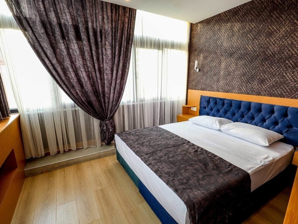 Imagen de la habitación del Grand Elmira Suites. Foto 6