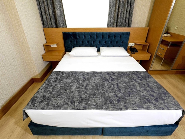 Imagen de la habitación del Grand Elmira Suites. Foto 12
