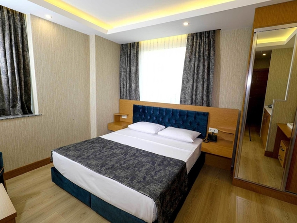 Imagen de la habitación del Grand Elmira Suites. Foto 13