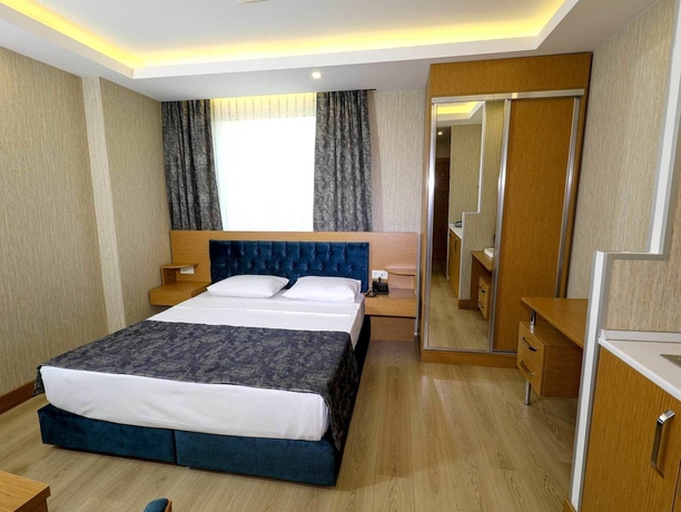 Imagen de la habitación del Grand Elmira Suites. Foto 14
