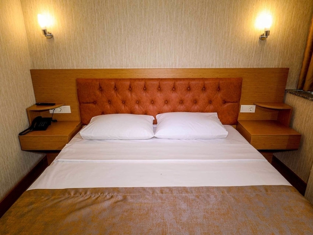 Imagen de la habitación del Grand Elmira Suites. Foto 15