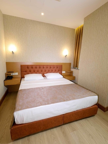 Imagen de la habitación del Grand Elmira Suites. Foto 16