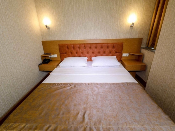 Imagen de la habitación del Grand Elmira Suites. Foto 17