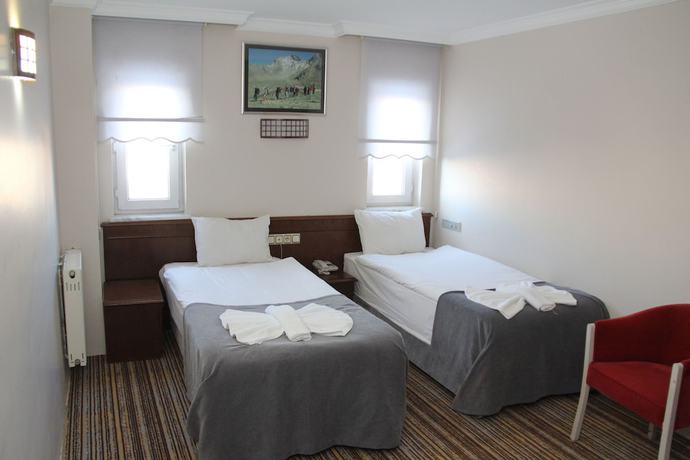 Imagen de la habitación del Grand Eras Hotel. Foto 7