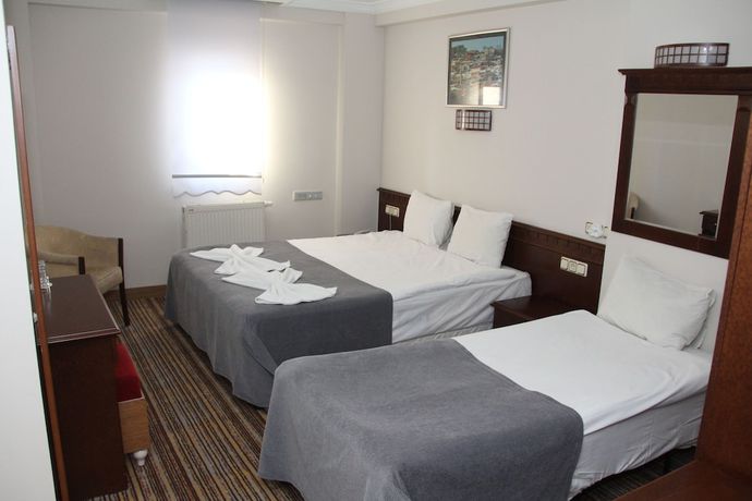 Imagen de la habitación del Grand Eras Hotel. Foto 9