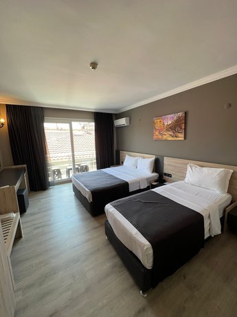 Imagen de la habitación del Grand Faik Hotel &Ccedil;eşme. Foto 15
