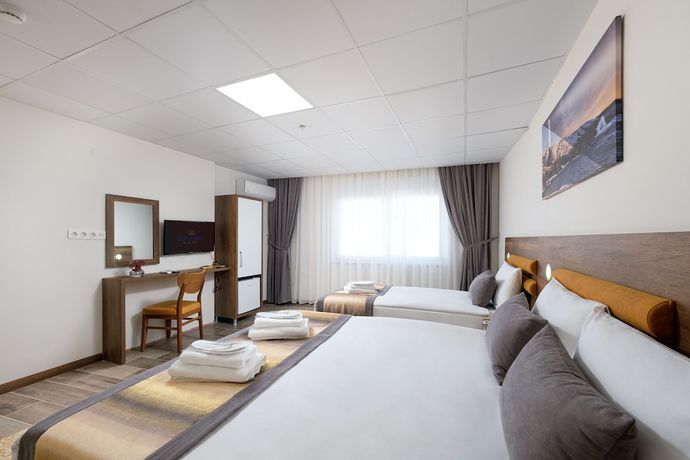 Imagen de la habitación del Grand Gulluk Hotel And Spa. Foto 10